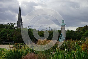 Langelinie Park with a monument to princess Mari and a spire of St Alban`s Church on the background