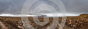 Langjokull Glacier behind huge muddy and rocky wasteland in the heart of iceland