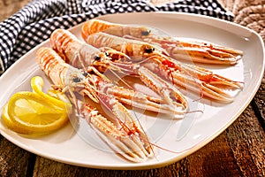 Langoustine Shellfish on Platter with Lemon Slices