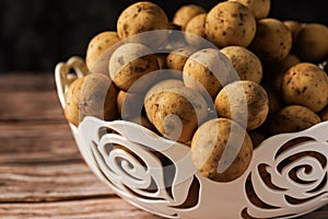 Langsat or Lanzones on wooden background