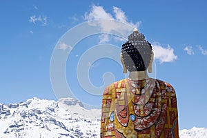 Langza Buddha statue looking at the Himalayan peaks, Spiti, Himachal Pradesh,