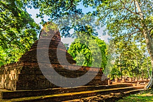 Lanka style ruins pagoda of Wat Mahathat temple in Muang Kao Historical Park, the ancient city of Phichit, Thailand. This tourist