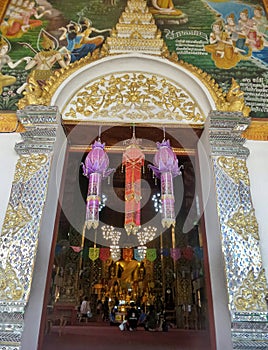 Lanna paper lantern hang on the entrance of Wat Phra That Hariphunchai pavilion