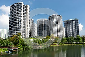 Lanscape view of condomium with trees near river