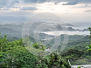 Lanscape view of Jiufen village, mountain and sea view. photo