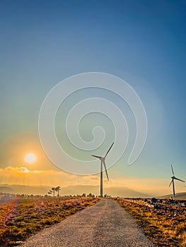 Lansdcape with wind turbines. Renewable energy on the middle of Serra da Freita Arouca Geopark, in center of Portugal photo