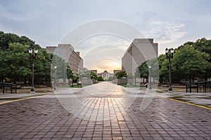 Lansing Michigan supreme court at sunset with a reflection through the city