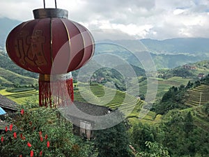 Lantern hanging from a tree Longji terrace in Guilin ,China