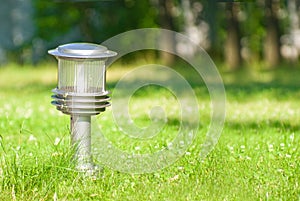 Lantern in the middle of a lawn