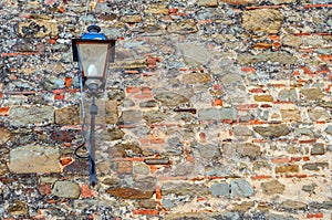 Lantern on an old wall