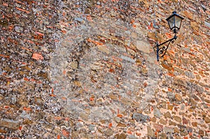 Lantern on an old wall