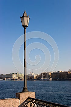 The lantern over embankment of the rive Neva