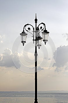 Lantern at the promenade of Lazise, Lake Garda, Italy