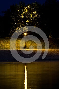 Lantern by the river at night, view from Ada island, Belgrade