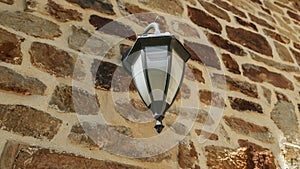 Lantern on the stone wall