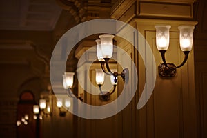 Lanterns attached to columns in a building