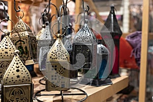 Lanterns from india in an antique shop photo