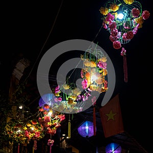 Lanterns made of cages, flowers on the streets of Hoi An, Vietnam