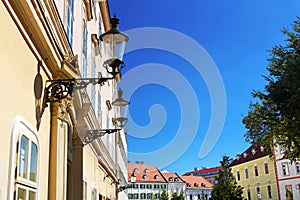 Lanterns in a row in the old town on Frantiskanske square in Bratislava, Slovakia