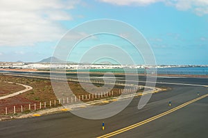 Lanzarote airport runaway with view on the city