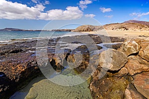 Lanzarote Playa del Pozo beach in costa Papagayo Canary Islands photo