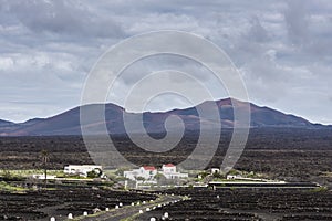 Lanzarote village and mountains of fire photo