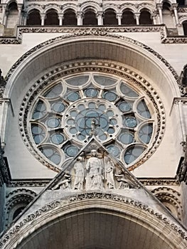 Laon cathedral stained glass rosette window from outside mediaeval gothic architecture Catholic church photo