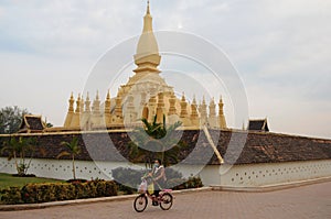 Laos: The holy buddhist Stupa That Luang in capital city Viantiane