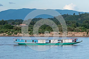 Laos transportation boat on Khong river in Golden triangle,Thailand.