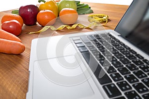 Lap top with fresh fruit