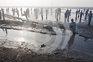 Statues in Lapindo mud.