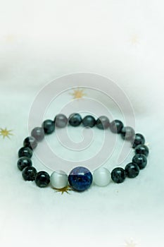 Lapis lazuli bead and Labradorite Crystal lucky stone bracelet bead on white towel background.fashion with believe in Add charm,pr