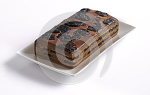 Lapis Legit or Thousand Layers Cake with prunes topping and filling, an Indonesian
