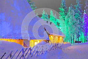 Lapland Suomi Houses Over the Polar Circle in Finland at Christmas photo