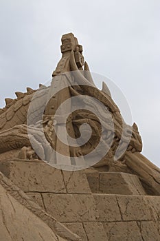 Lappeenranta. Enslaved dragon. Sand sculpture, right side view, close up