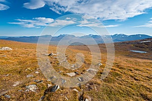 Lapponian gate, famous mountain pass in the Swedish arctic in beautiful autumn colors on a sunny day. Viewed from Nuolja