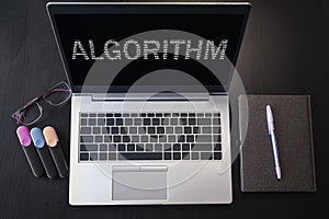 Laptop with algorithm text. Top view. Algorithm inscription on laptop screen