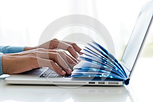 Laptop as a book. Internet network as knowledge base. E-learning concept