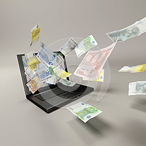 Laptop and banknotes