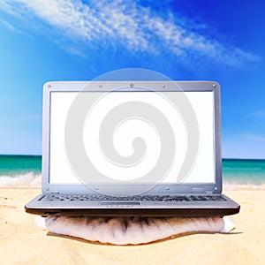 Laptop on beach