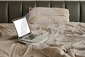 Laptop on bed. work at home or working frome home concept