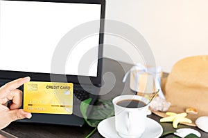 Laptop with blank screen for mockup eCommerce concept with paying money by use credit card. Online Technology Payment