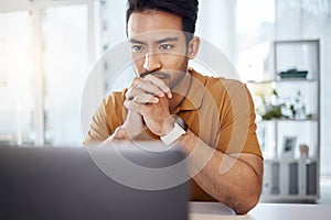 Laptop, business and Asian man with focus, thinking and ideas for new project, creativity or online reading. Male