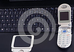 a laptop and cell phone photo