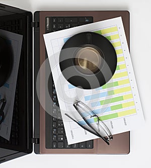 Laptop, Chart, Glasses and Coffee