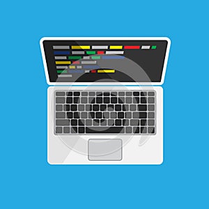 Laptop with code on the monitor screen top view.