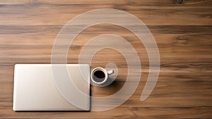 Laptop and coffee cup on wooden table, top view with copy space