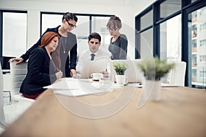 Laptop, collaboration and business people in a meeting in the office conference room for planning. Technology, teamwork