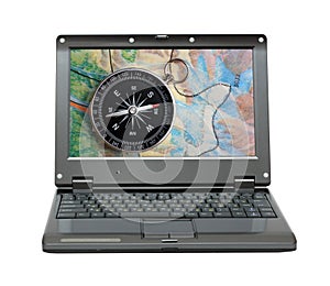 Laptop with compass and map