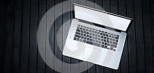 Laptop Computer Banner Black Background photo